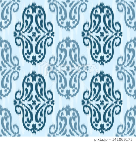 Ikat seamless pattern. Abstract ethnic vector design. Tribal blue textured vintage background. Traditional retro ornament with dye grunge effect. Ikat seamless pattern. Abstract ethnic vector design. Tribal blue textured vintage background. Traditional retro ornament with dye grunge effect. 141069173