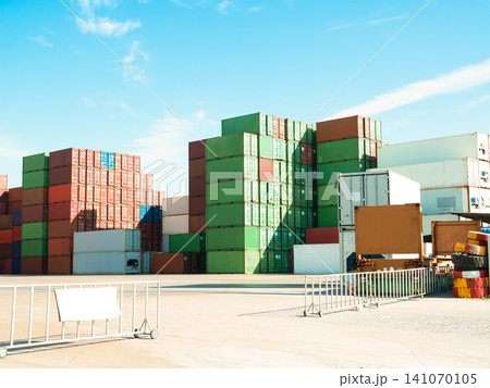 Container cargo industrial yard shipping export logistic crane forklift port blue sky background space road import business freight logistic transport industry service, transportation terminal. Container cargo industrial yard shipping export logistic crane forklift port blue sky background space road import business freight logistic transport industry service, transportation terminal. 141070105