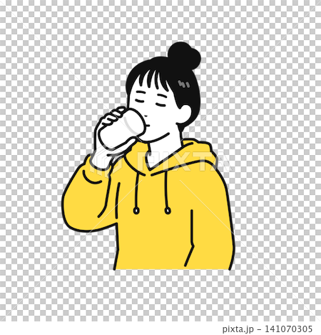 A young woman with her hair tied up drinks water from a glass. A young woman with her hair tied up drinks water from a glass. 141070305