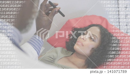 Woman reclining on clinic couch with red pillow, doctor in white coat holding stylus binary overlay 141071789