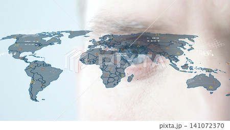 Focusing male right eye and skin, reflecting translucent world map overlay in studio with UI panels Focusing male right eye and skin, reflecting translucent world map overlay in studio with UI panels 141072370