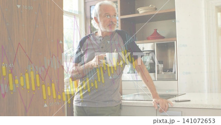 Holding mug, man in polo leaning on light countertop at modern kitchen, tablet and finance overlays Holding mug, man in polo leaning on light countertop at modern kitchen, tablet and finance overlays 141072653
