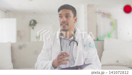 Talking doctor wearing lab coat and stethoscope, holding clipboard and pen on sofa with red mark Talking doctor wearing lab coat and stethoscope, holding clipboard and pen on sofa with red mark 141072812