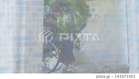 Framing leafy plant with vines partially obscuring bicycle wheel on small porch, binary overlay Framing leafy plant with vines partially obscuring bicycle wheel on small porch, binary overlay 141073301