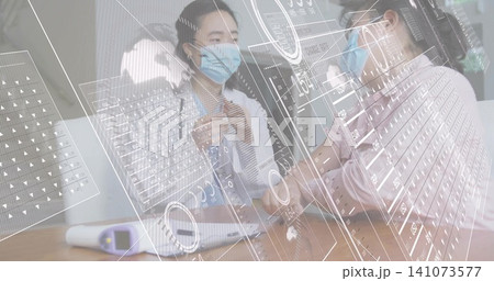 Adjusting masked doctor in white coat wearing stethoscope checking masked patient arm at table, HUD Adjusting masked doctor in white coat wearing stethoscope checking masked patient arm at table, HUD 141073577