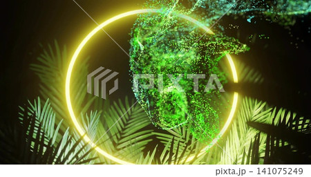 Glowing yellow neon ring emitting light while green particle vortex rising in studio, palm fronds Glowing yellow neon ring emitting light while green particle vortex rising in studio, palm fronds 141075249