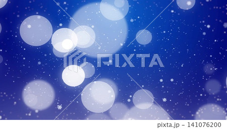 Drifting winter bokeh pattern filling digital blue backdrop, showing snowflakes and light orbs Drifting winter bokeh pattern filling digital blue backdrop, showing snowflakes and light orbs 141076200