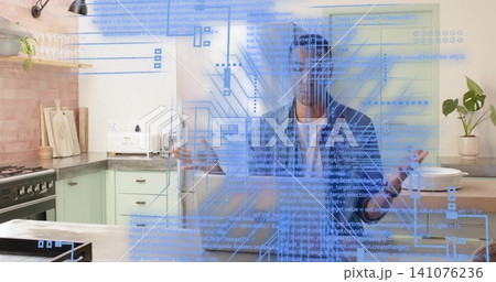 Opening man in casual clothing checking fridge in home kitchen with holographic overlay 141076236