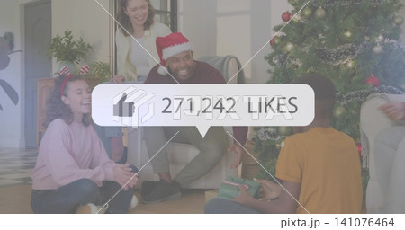 Gathering family wearing Santa hat, reindeer headband at home, with gifts showing 271,242 LIKES 141076464