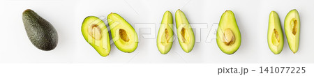 Whole and sliced avocado on white background, top view Whole and sliced avocado on white background, top view 141077225