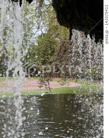 Lake in Ghent park. Waterfall 141078411
