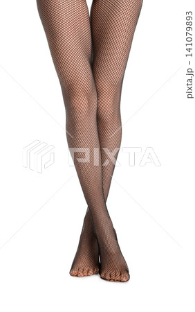 Woman wearing black tights and stylish shoes on light grey background, closeup of legs 141079893