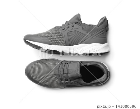 Pair of stylish shoes on white background, top view 141080396