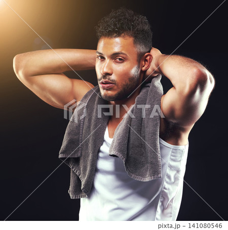 Fitness, towel and portrait of man on black background for exercise, training and intense workout. Bodybuilder, sports and serious person with muscles for performance, wellness and health in studio Fitness, towel and portrait of man on black background for exercise, training and intense workout. Bodybuilder, sports and serious person with muscles for performance, wellness and health in studio 141080546