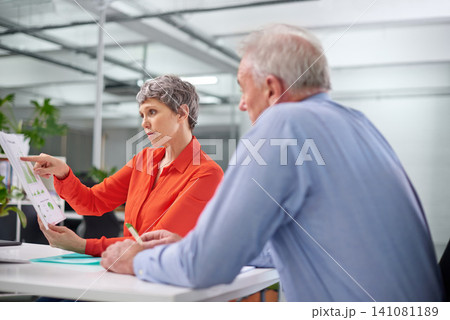 Document, team and mature business people planning, discussion or brainstorming strategy with data in office. Manager, man and serious woman in collaboration with statistics for financial analysts 141081189