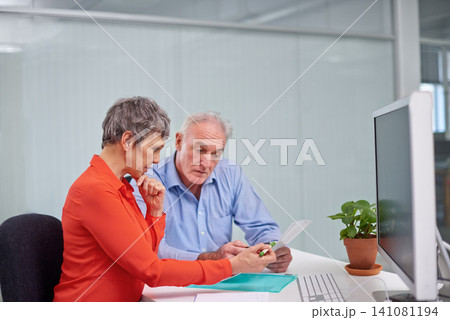Documents, discussion and senior woman with financial advisor planning for pension fund in office. Conversation, paperwork and elderly female person with finance consultant for retirement savings. Documents, discussion and senior woman with financial advisor planning for pension fund in office. Conversation, paperwork and elderly female person with finance consultant for retirement savings. 141081194