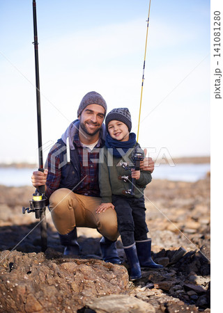 Portrait, dad and son with nature, smile and happiness for bonding on break. Child, water and ocean with rocks, adventure and vacation on fishing trip with childhood memories and parent fun at sea Portrait, dad and son with nature, smile and happiness for bonding on break. Child, water and ocean with rocks, adventure and vacation on fishing trip with childhood memories and parent fun at sea 141081280