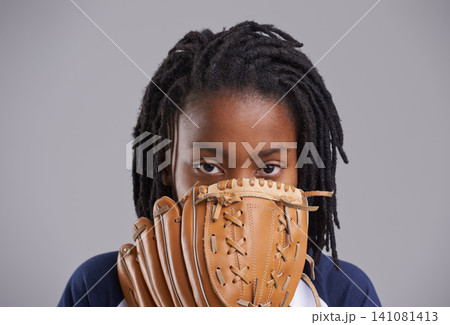 Sports, baseball and portrait of child on gray background with glove for training, practice and match. Fitness, youth and young boy with equipment for exercise, playing games and pitch in studio Sports, baseball and portrait of child on gray background with glove for training, practice and match. Fitness, youth and young boy with equipment for exercise, playing games and pitch in studio 141081413