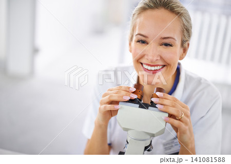 Happy woman, portrait and research scientist with microscope exam, test or scientific discovery at laboratory. Face of female person or medical expert with smile or scope for breakthrough in biology Happy woman, portrait and research scientist with microscope exam, test or scientific discovery at laboratory. Face of female person or medical expert with smile or scope for breakthrough in biology 141081588