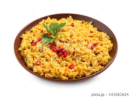 Tasty rice pilaf with pomegranate grains and parsley isolated on white 141081624