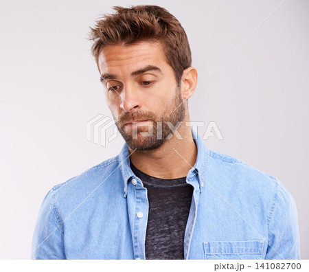 Man, thinking or reflection with insight for solution, problem solving and decision on white background. Mindfulness, pensive and sad memory with thoughtful expression, choice or remember in studio Man, thinking or reflection with insight for solution, problem solving and decision on white background. Mindfulness, pensive and sad memory with thoughtful expression, choice or remember in studio 141082700