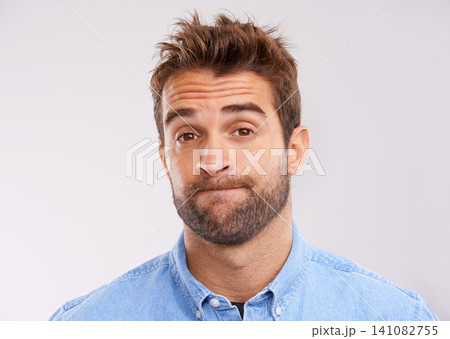 Studio, portrait and bored man with doubt, frustrated and confused on white background. Opinion, disappointment and face of person with decision, conflict or uncertainty for choice, news or ideas Studio, portrait and bored man with doubt, frustrated and confused on white background. Opinion, disappointment and face of person with decision, conflict or uncertainty for choice, news or ideas 141082755