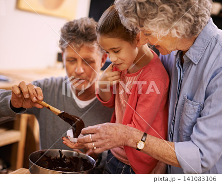 Help, grandparents and baking with girl, kitchen and home with happiness and bonding together with recipe. Family, grandchild and old man with senior woman and hobby with utensils, food and taste 141083106