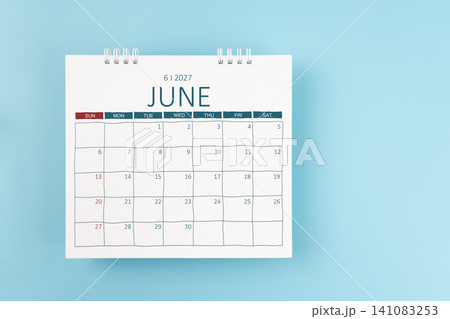 June 2027 Monthly desk calendar for 2026 year on blue color background. Flat lay. 141083253