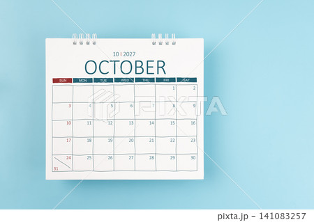 October 2027 Monthly desk calendar for 2026 year on blue color background. Flat lay. 141083257