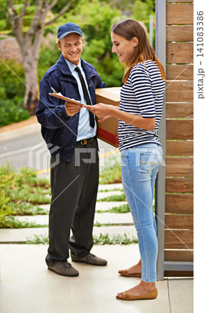 Package, clipboard and deliveryman with woman at her home gate for ecommerce shipping parcel. Outdoor, order and courier driver with cardboard box with female person for signature at house entrance. Package, clipboard and deliveryman with woman at her home gate for ecommerce shipping parcel. Outdoor, order and courier driver with cardboard box with female person for signature at house entrance. 141083386
