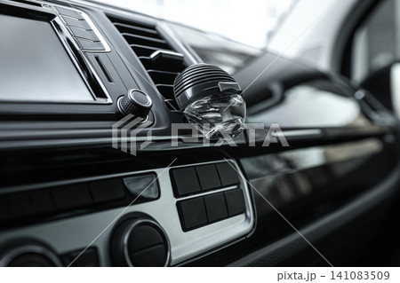 Stylish air freshener clip attached to car ventilation Stylish air freshener clip attached to car ventilation 141083509
