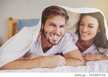 Smile, love and couple with blanket for relaxing, bonding and resting on bed together at home. Happy, romantic and young man and woman laying with duvet in bedroom at hotel, house or apartment. Smile, love and couple with blanket for relaxing, bonding and resting on bed together at home. Happy, romantic and young man and woman laying with duvet in bedroom at hotel, house or apartment. 141083710