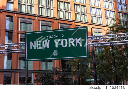 Welcome to New York green road sign in the city Welcome to New York green road sign in the city 141084418
