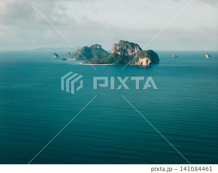 Panoramic aerial seascape of scattered limestone islands in the vast calm Andaman Sea, Krabi. Panoramic aerial seascape of scattered limestone islands in the vast calm Andaman Sea, Krabi. 141084461