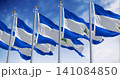 Nicaraguan national flags waving with coat of arms and blue-white tricolor 141084850