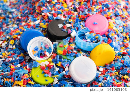 Colorful plastic bottle caps pile. Colorful plastic bottle caps pile. 141085108