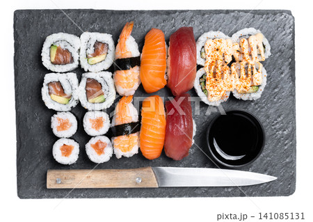 Assorted sushi platter with nigiri and maki rolls 141085131
