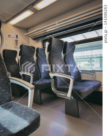 Empty Passenger Seats Inside a Modern Train Carriage Empty Passenger Seats Inside a Modern Train Carriage 141086263