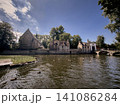Scenic View of Minnewater Lake and Historic Buildings in Bruges 141086284