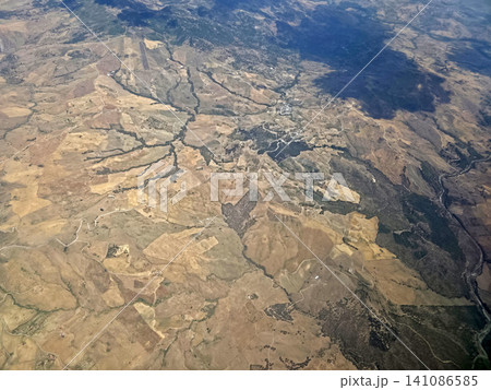 sicily farmed fields while landing at catania airport aerial view panorama 141086585