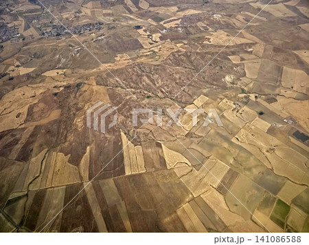 sicily farmed fields while landing at catania airport aerial view panorama sicily farmed fields while landing at catania airport aerial view panorama 141086588
