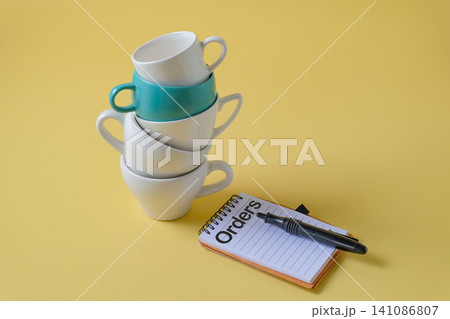 A stack of coffee cup on background.Food and drink. A stack of coffee cup on background.Food and drink. 141086807