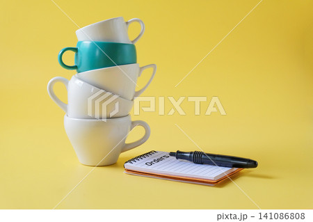 A stack of coffee cup on background.Food and drink. A stack of coffee cup on background.Food and drink. 141086808