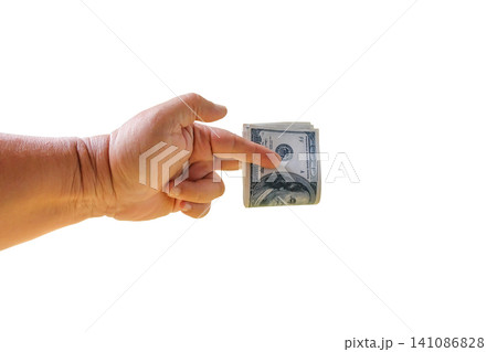 Hand holding a dollar banknote on white background. Hand holding a dollar banknote on white background. 141086828