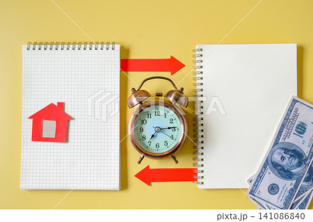 Open spiral notebook with red arrow on color background.Business planning and strategy concept. 141086840