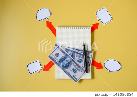 US. banknote with red arrow on color background.Moneys way concept. 141086854