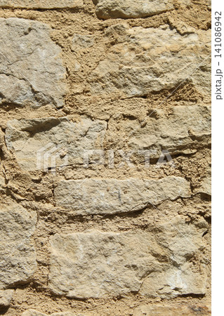 Vertical Ancient Stone Wall Texture Vertical Ancient Stone Wall Texture 141086942