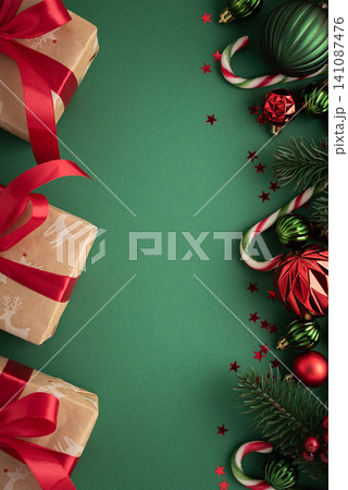 Christmas gifts and ornaments creating a festive holiday frame Christmas gifts and ornaments creating a festive holiday frame 141087476