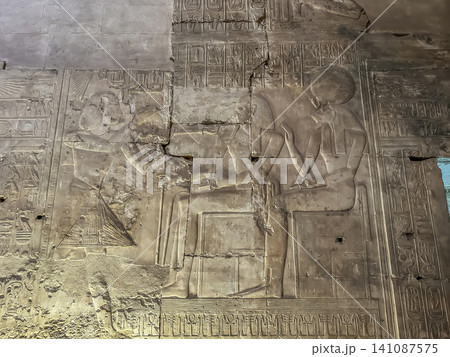 Beautiful bas-reliefs and ancient hieroglyphs in the Temple of Seti I in Abydos, Egypt. Beautiful bas-reliefs and ancient hieroglyphs in the Temple of Seti I in Abydos, Egypt. 141087575