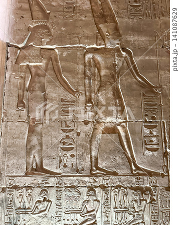 Beautiful bas-reliefs and ancient hieroglyphs in the Temple of Seti I in Abydos, Egypt. Beautiful bas-reliefs and ancient hieroglyphs in the Temple of Seti I in Abydos, Egypt. 141087629